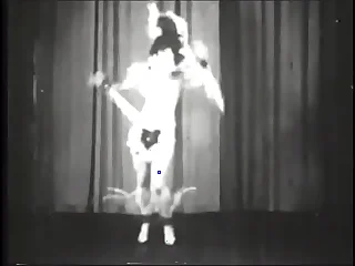 Retro whore staginess strip dance on stage